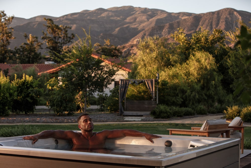Man is Relaxing in a hot tub